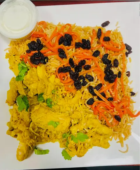 Chicken shawarma served over Qabli rice